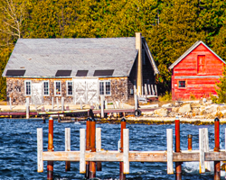 These former fishing sheds still grace the Ellison Bay, WI, shoreline.