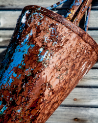 Wind and water work their magic on paint and iron.