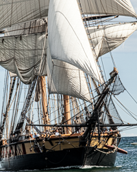 A tall ship sails the waters of Lake Michigan.